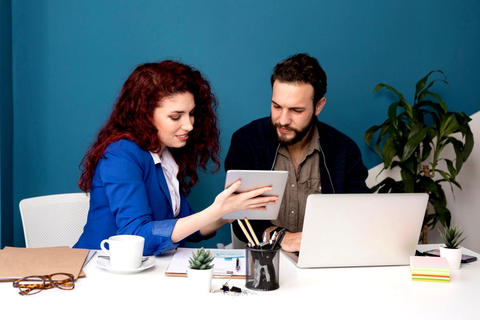 Person reviewing financial documents and planning budget